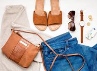 Summer street style. Fashion summer girl clothes set, accessories. Trendy sunglasses, slippers, handbag clutch,  watch, jeans. Summer lady. Creative urban overhead summer top view